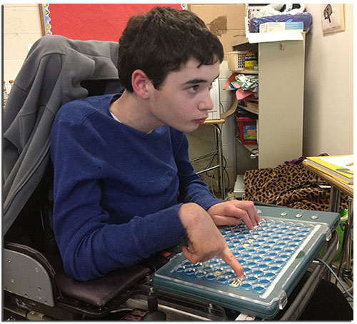 Young man using assistive technology to access a website.
